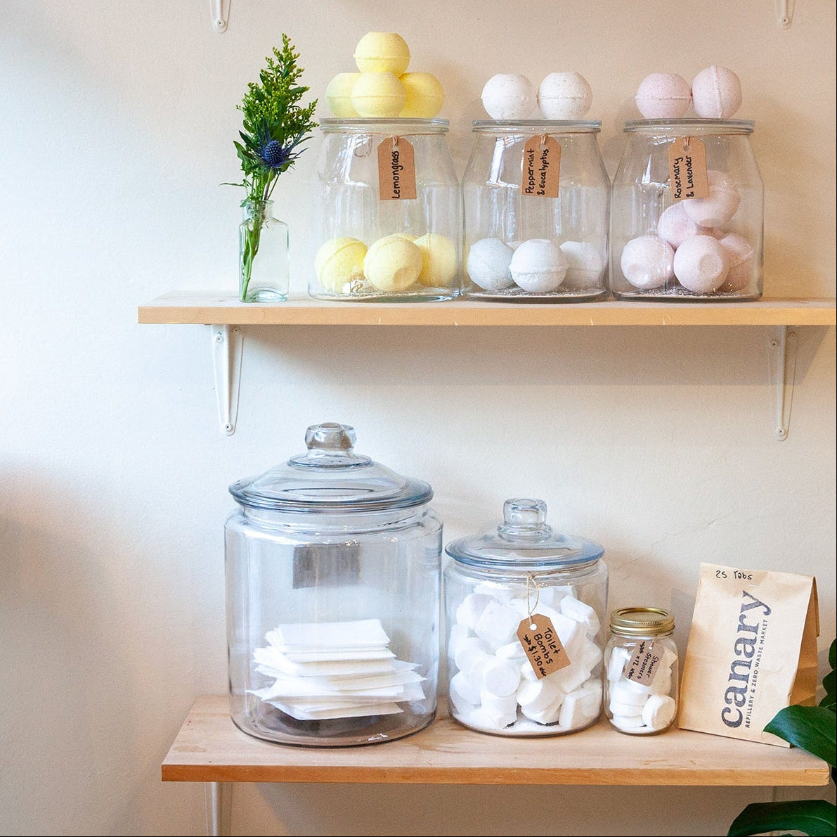 Shelves with jars and decorative items in a kitchen setting